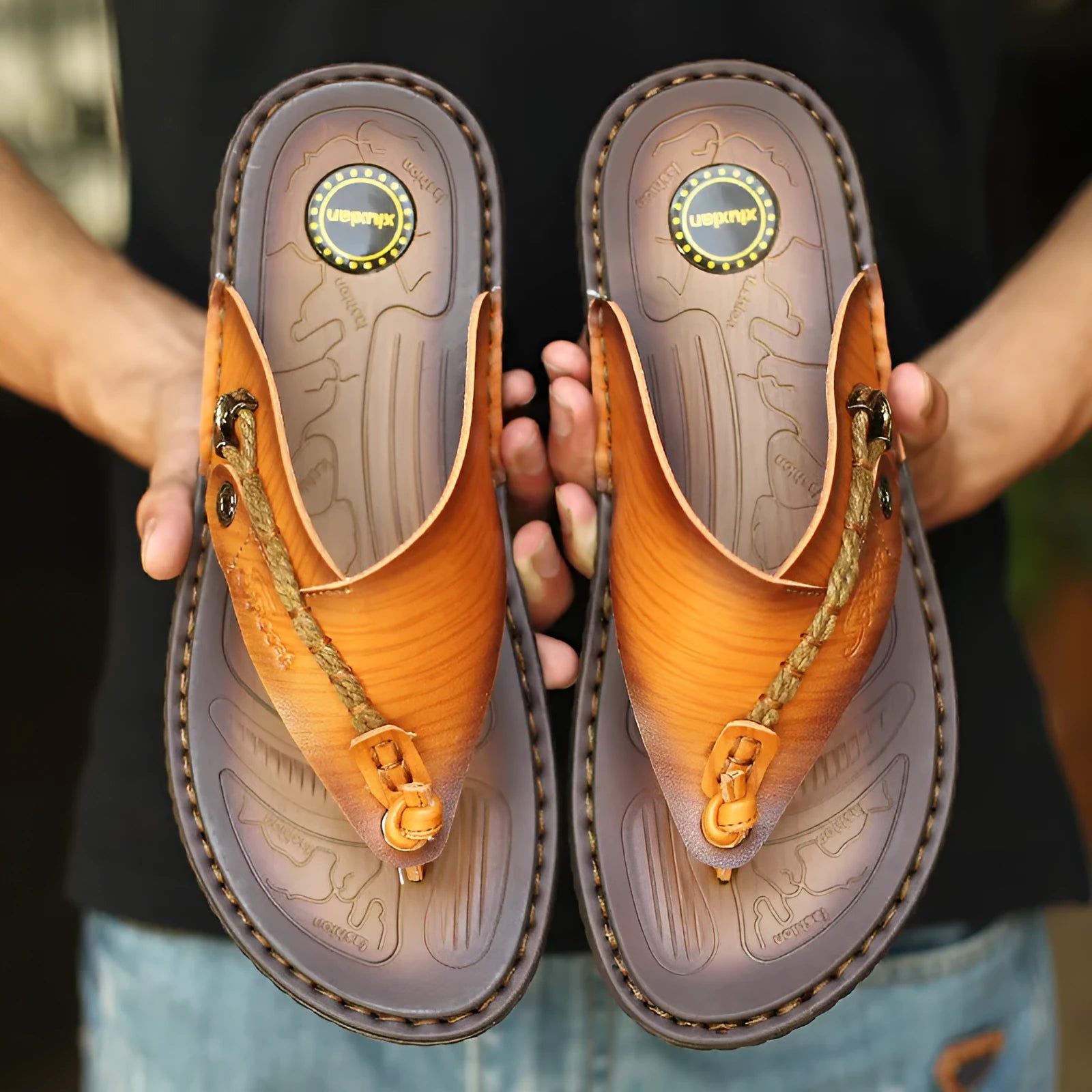 Men's dark blue herringbone pattern outdoor slippers with a rubber sole, shown from the side.