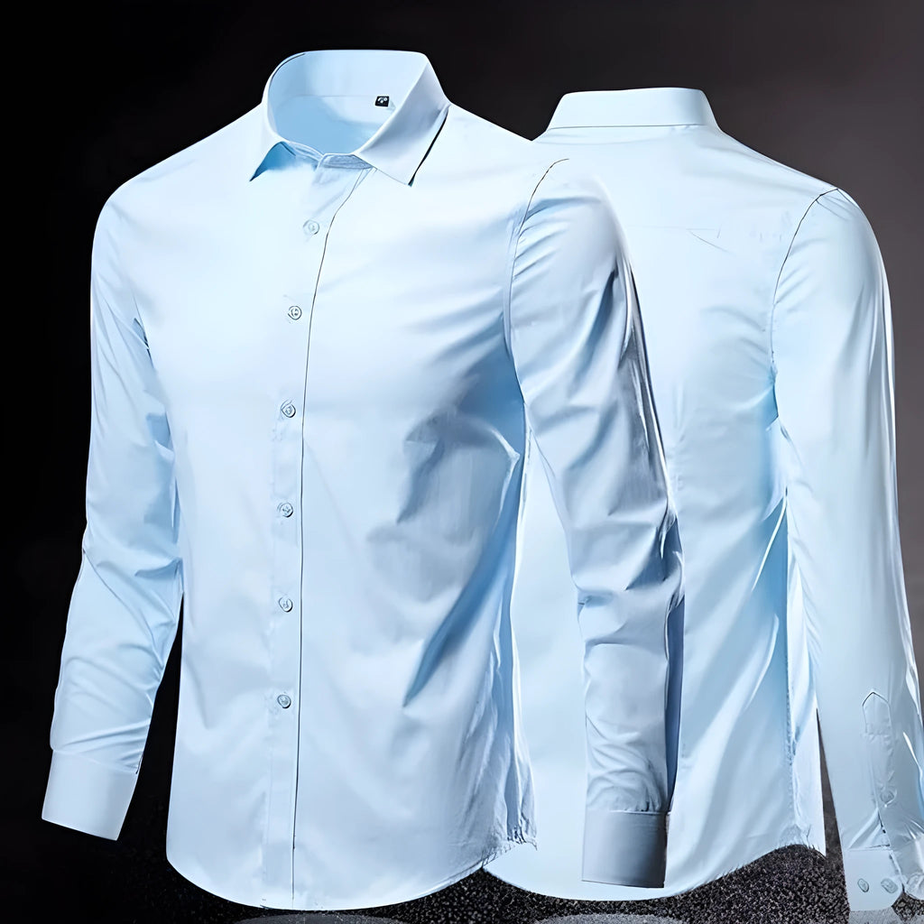 Men's loose-fit long-sleeve linen shirt shown in a neutral colour, featuring a button front and long sleeves.