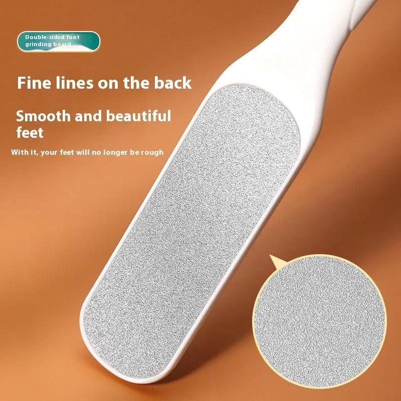 Stainless steel double-sided foot grinder with black and white tools for callus removal