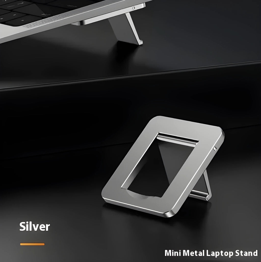 Compact folding aluminium laptop stand bracket in silver with adhesive strips