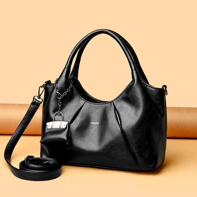 Trendy niche women's new shoulder bag in genuine leather with dumpling shape and pleated detail, khaki colour