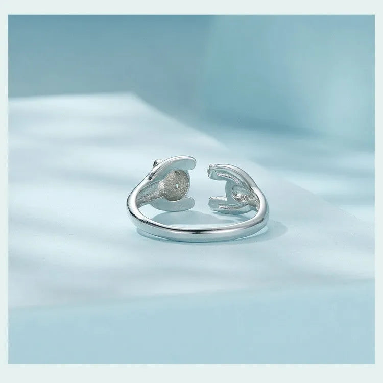 Adjustable sterling silver panda ring bracelet with white gold plating and drip oil finish.