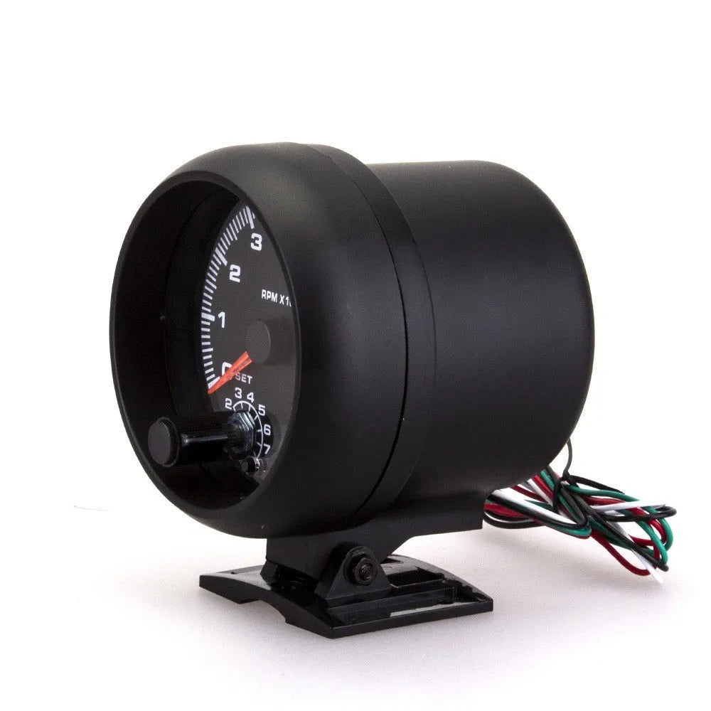Black automotive tachometer with blue light pointer for engine speed measurement