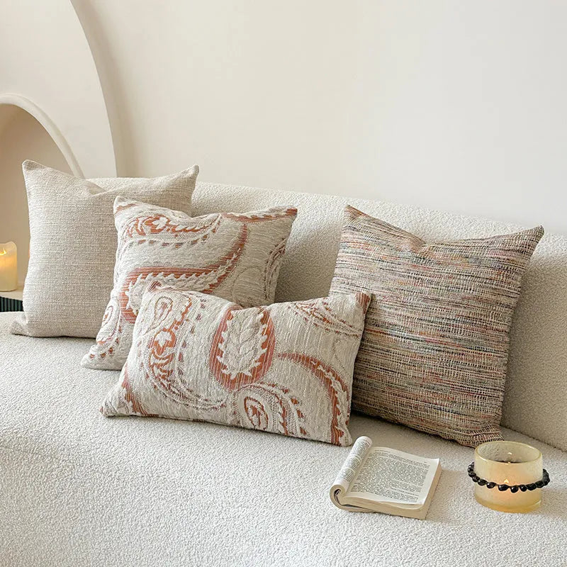 Amber jacquard paisley patterned sofa cushion cover with botanical floral design.