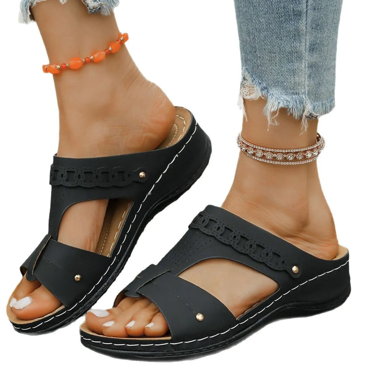 Casual Roman style slope heel slippers with a fish mouth toe holder, shown in available colours.