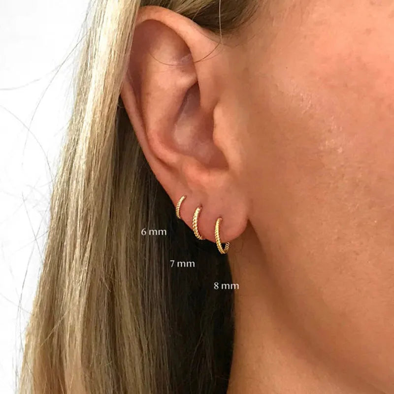 Sterling silver twisted hipster earrings in geometric round design with gold or platinum plating