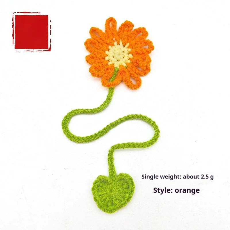Hand-crocheted wool bookmark with daisy design on flexible wire in multiple colour options