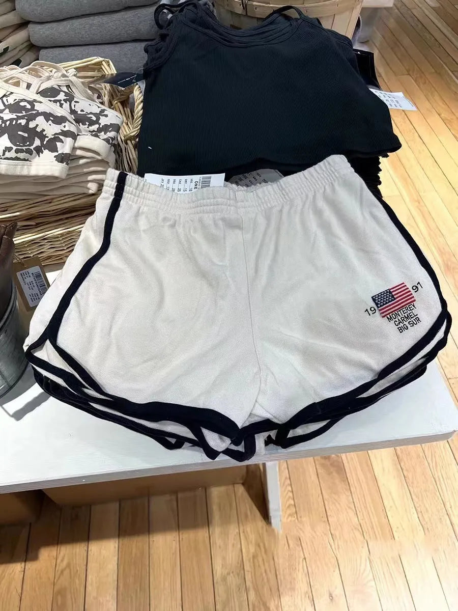 Women's dark blue cotton sports hot pants with white flag embroidery, high top style shorts