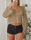 Women's apricot hollow woven cardigan blouse with bell sleeves laid flat