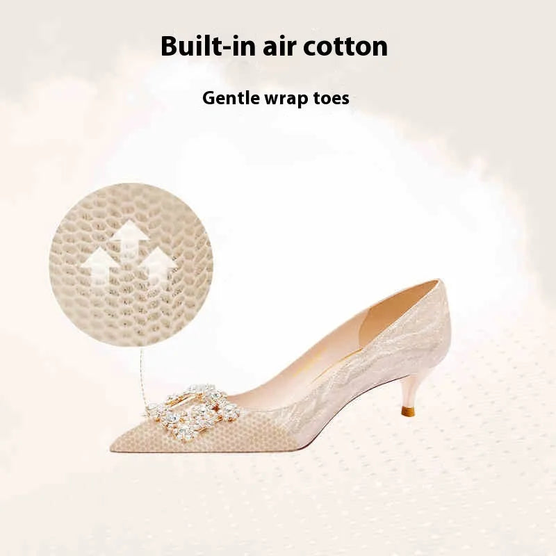 Champagne gold women's leather high heel pumps with pointed toe, stiletto heel, and rhinestone decoration.