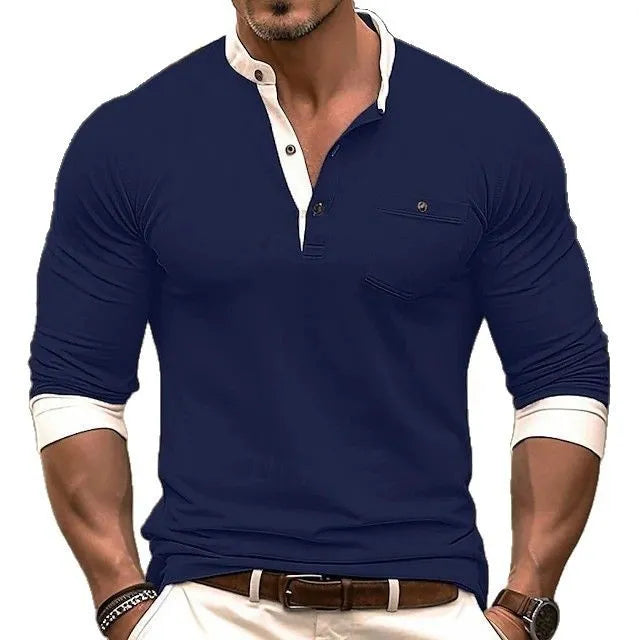 Man wearing a solid colour long sleeve cotton t-shirt in grey, showing round neck and casual fit.