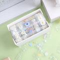 Five rolls of transparent decorative adhesive tape in Midsummer Daisy colour for diary decoration