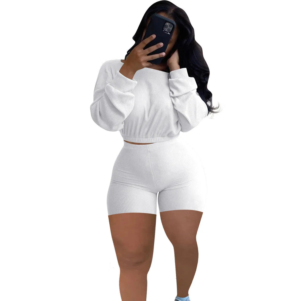 Sunken stripe solid colour off-the-shoulder long sleeve top and shorts two-piece set on a hanger.