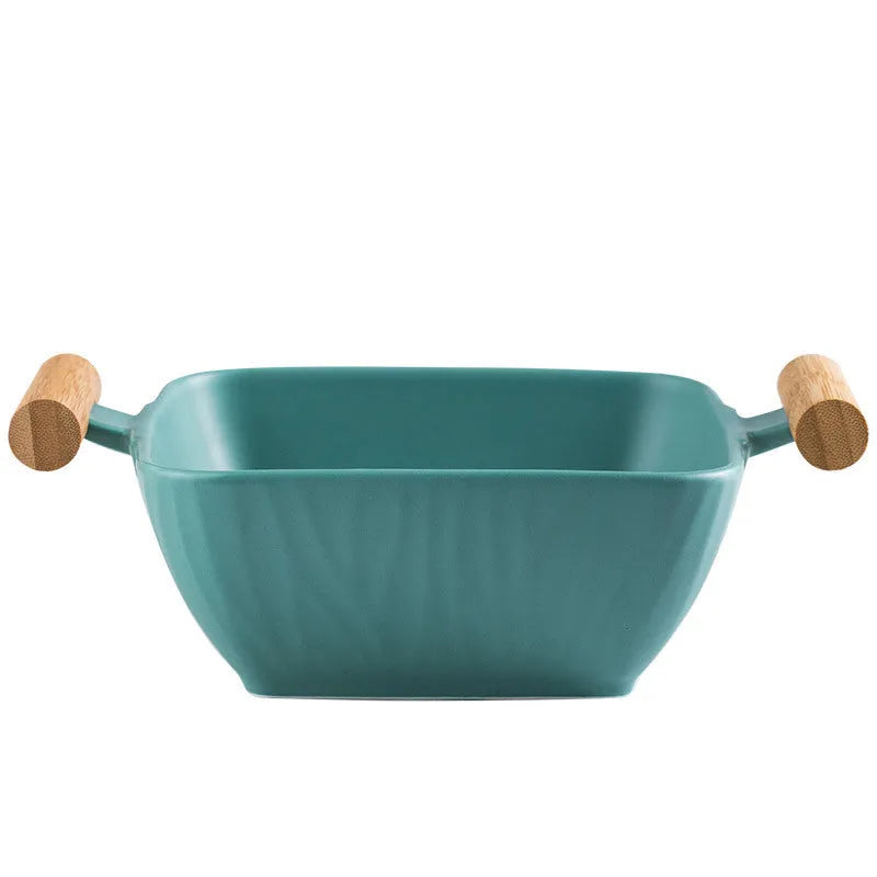 Porcelain ceramic bowl with lid in irregular shape design, shown in available colour options.