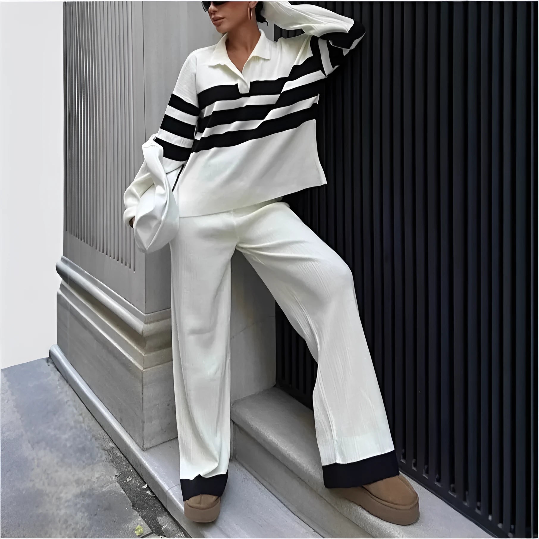 Women's black and white striped polo collar knitted shirt with contrasting trousers two-piece set