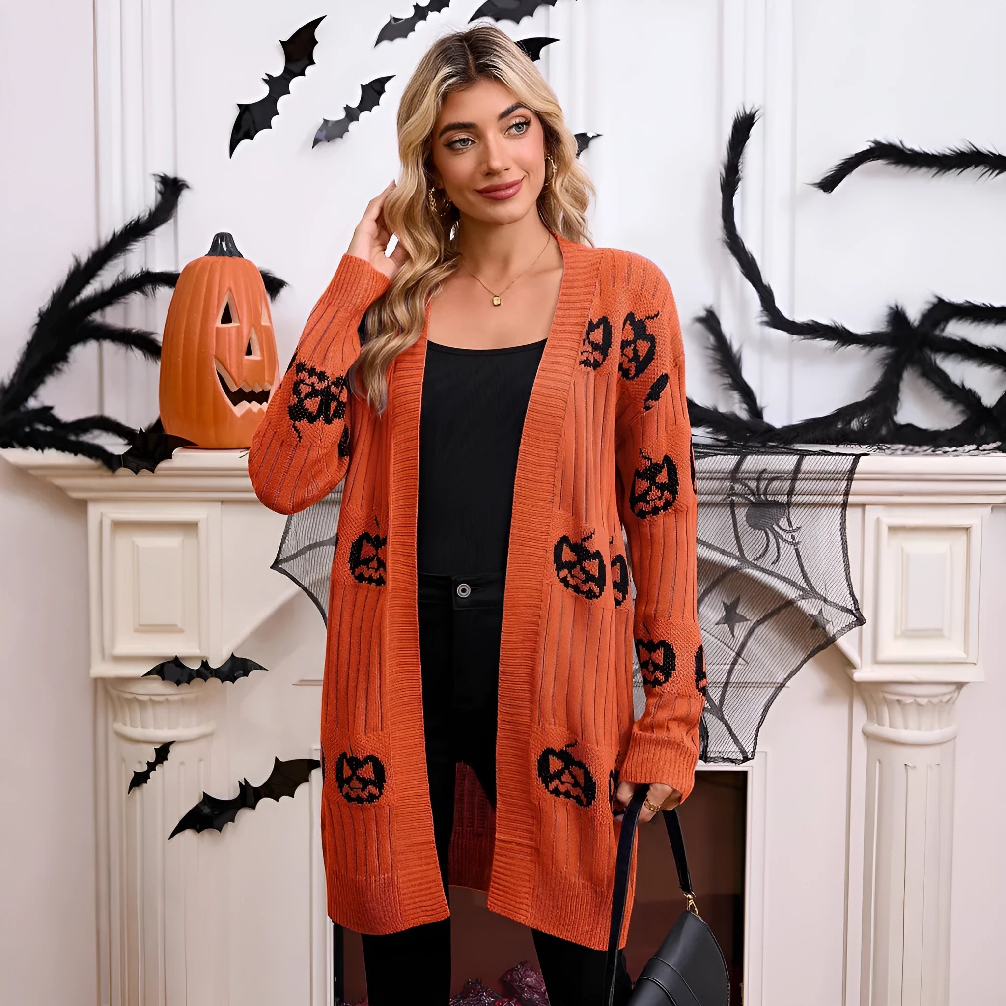 Women's black Halloween cardigan with knitted pumpkin head pattern, straight fit with regular sleeves