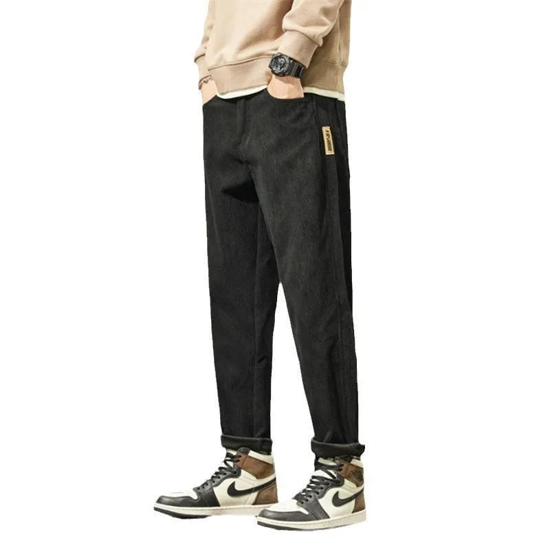 Corduroy men's casual straight-leg trousers in solid colour with mid-waist rise and zipper fly
