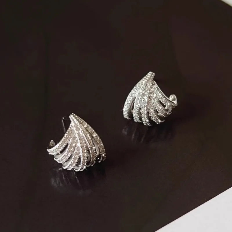 Women's platinum electroplated geometric earrings with line design and zircon details
