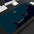 Full black extended extra long rubber mouse pad on desk with keyboard and mouse