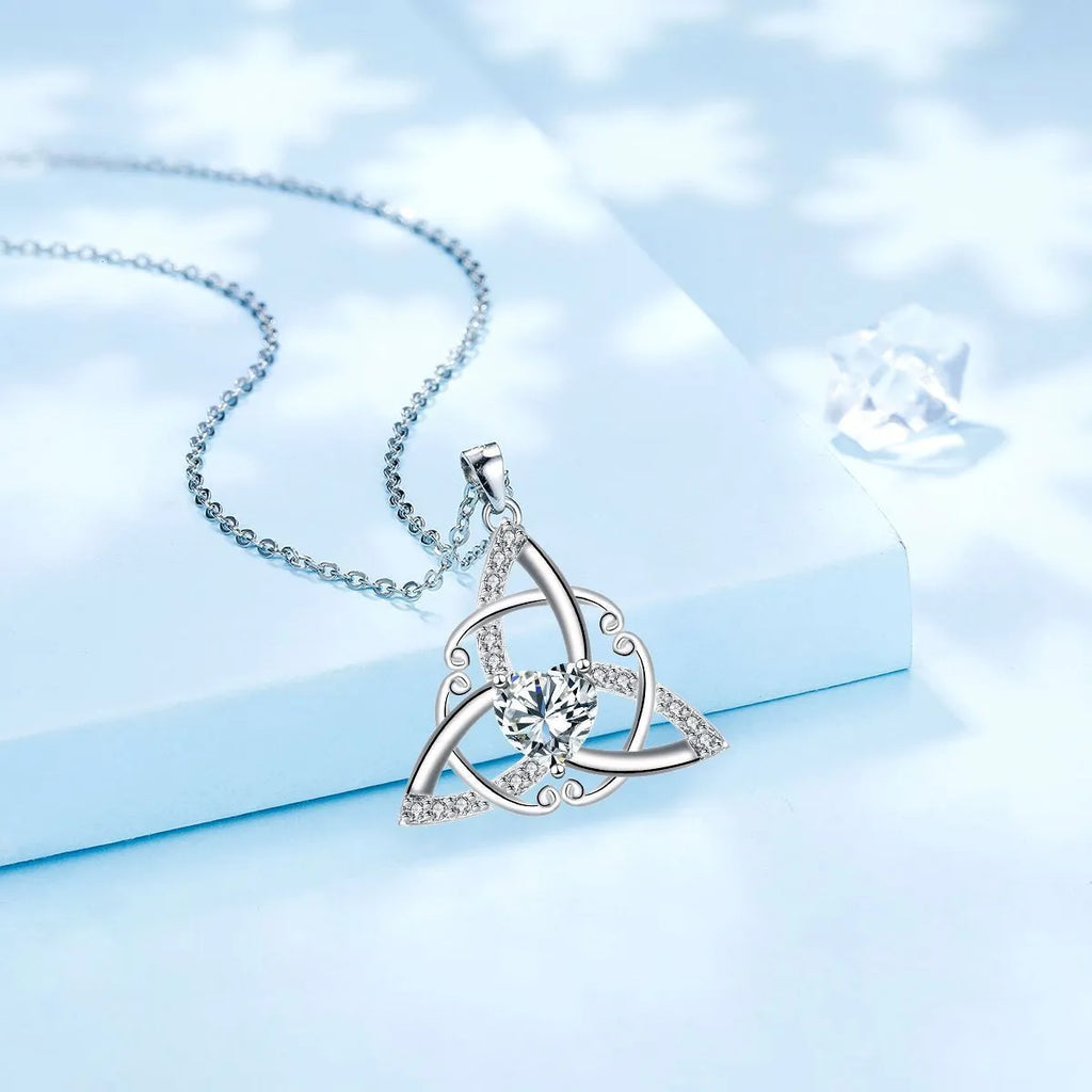 Women's Celtic knot necklace in copper with geometric pendant showing electroplated colour options