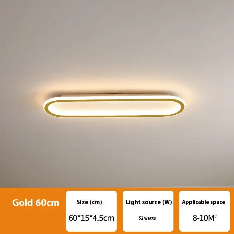 Black aluminium strip ceiling lamp with PVC shade in 60cm length mounted on a white ceiling.