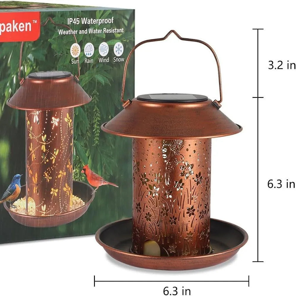 Solar-powered iron art hummingbird garden feeder lamp with waterproof IP65 rating.