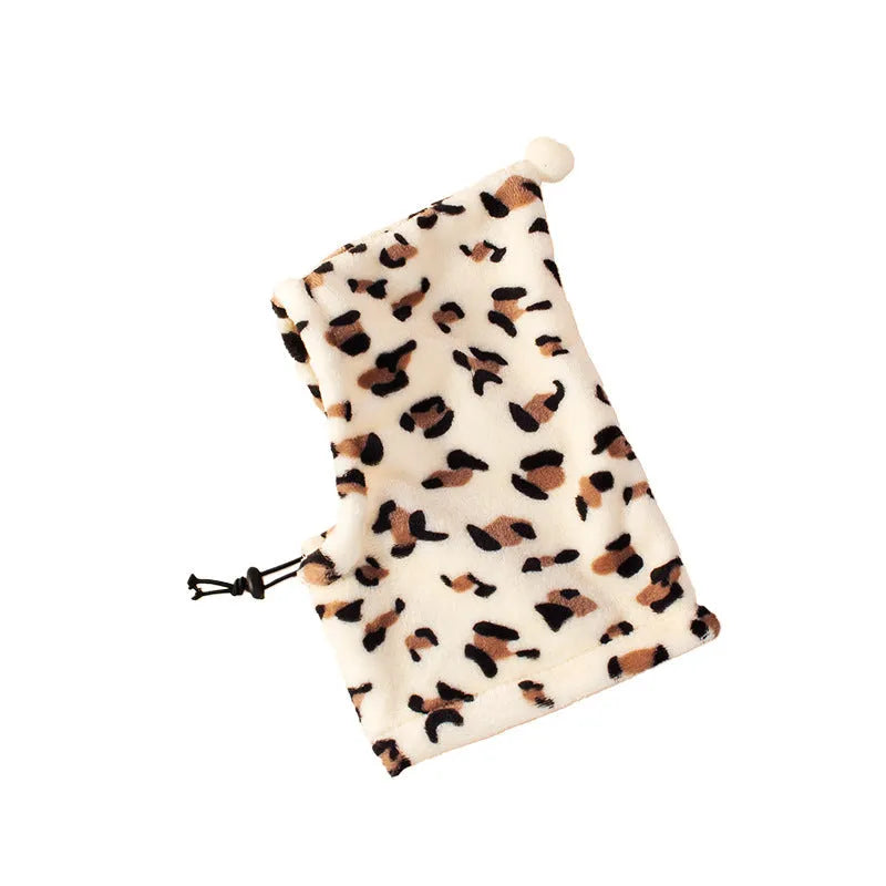Pet wearing cloth headgear with animal ears in leopard print colour
