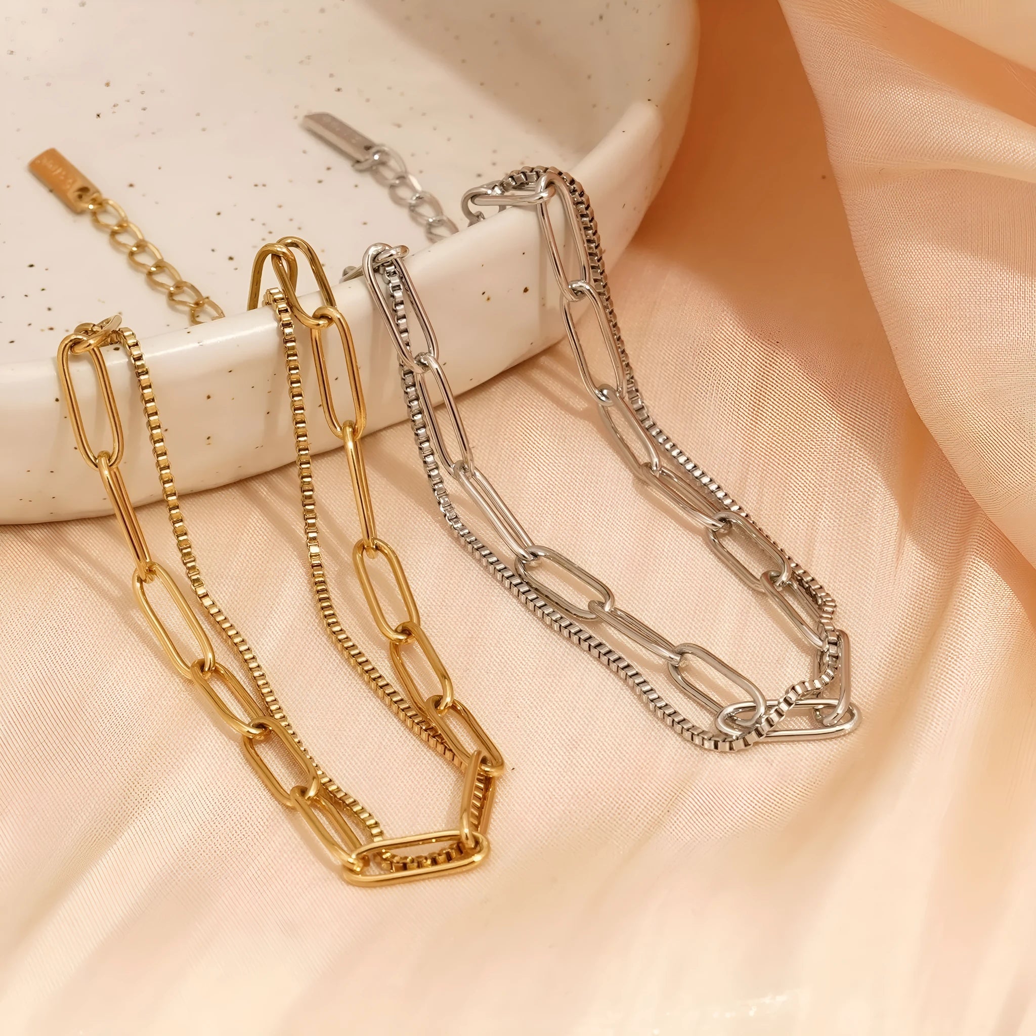 Gold and silver geometric double-layer stainless steel women's bracelet with linear design.