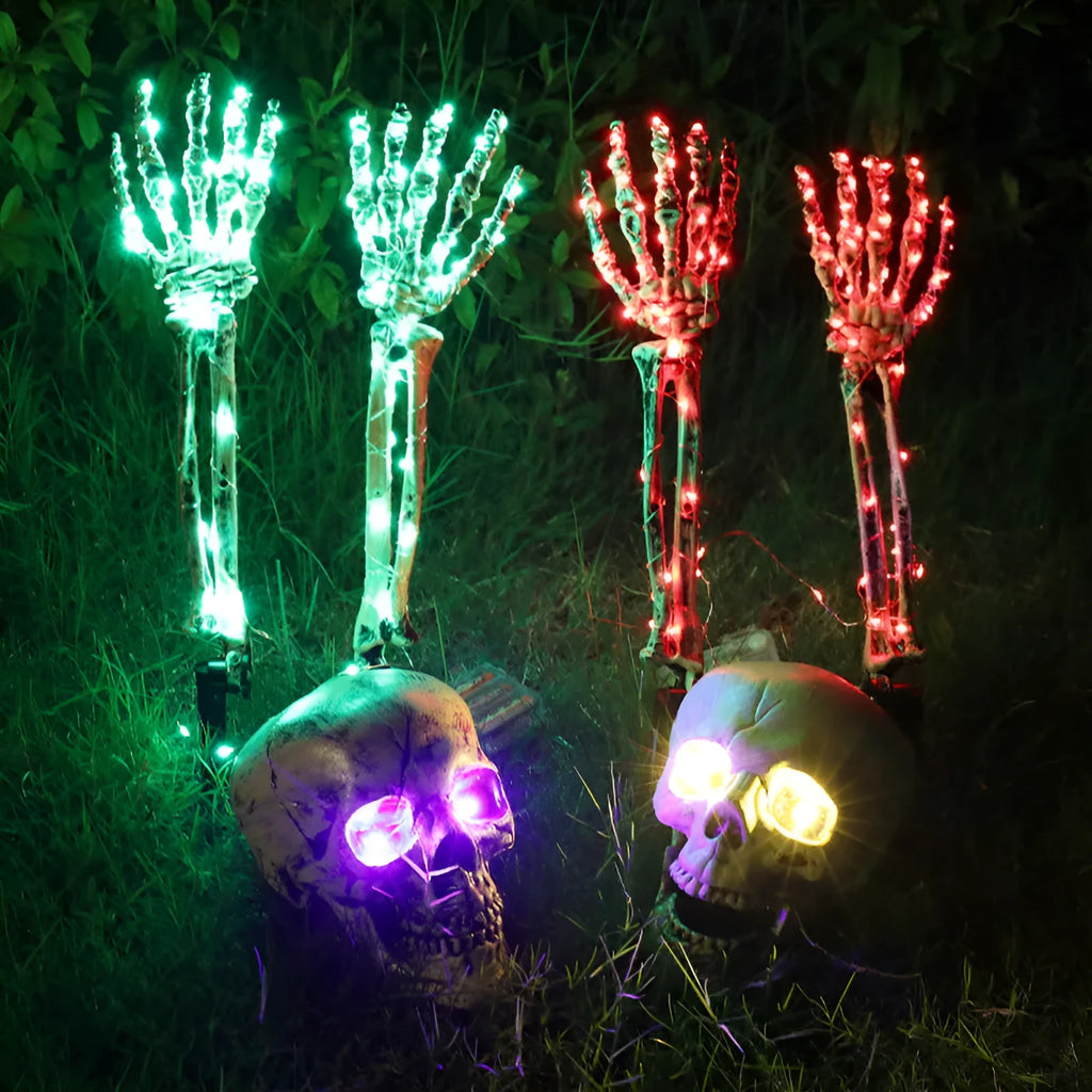 Purple LED skeleton arm hand Halloween ground stake light for garden decoration.