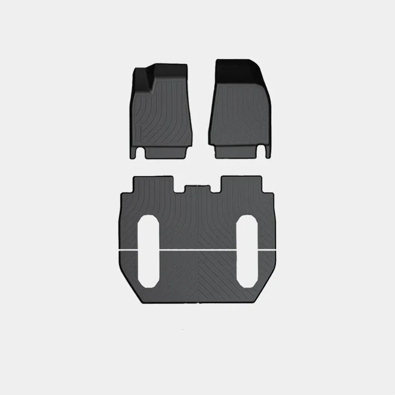 Rubber floor mat set for Tesla Model X showing foot pads and tailbox cushion for interior protection
