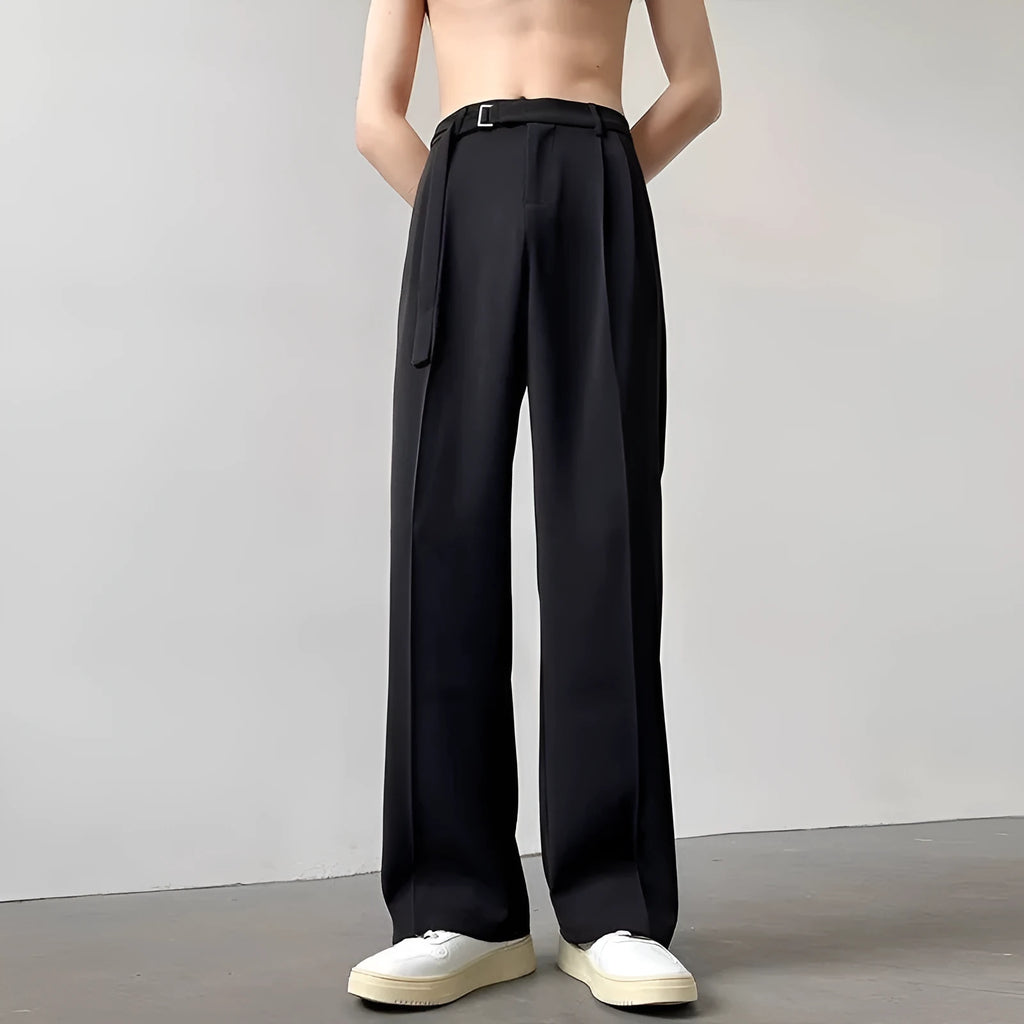 Thin straight leg black wide trousers with non-ironing finish and loose fit casual style