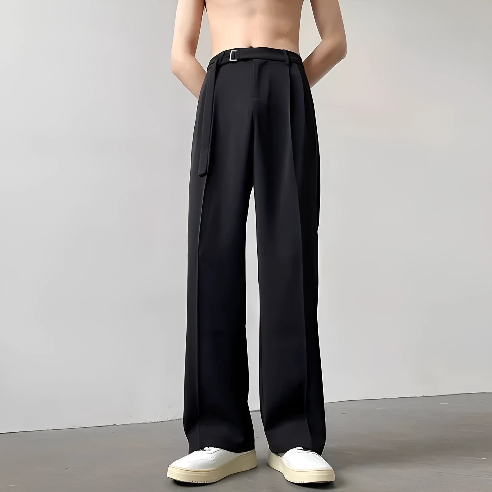 Thin straight leg black wide trousers with non-ironing finish and loose fit casual style