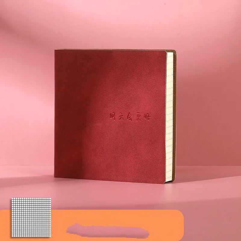 Mesh leather cover notebook open on a blank page, showcasing French fold binding and Daolin paper.