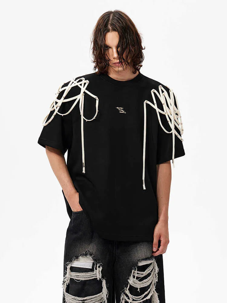 Black loose fit short sleeve T-shirt with padded shoulder and rivet ribbon detail
