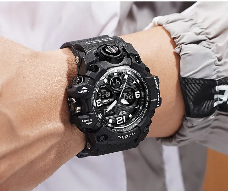 Electronic sports watch with dual analogue and digital display on plastic strap