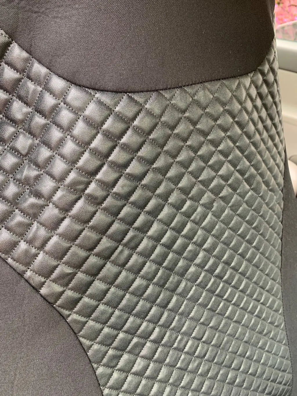 Black quilted automotive seat cover with universal fit for car protection