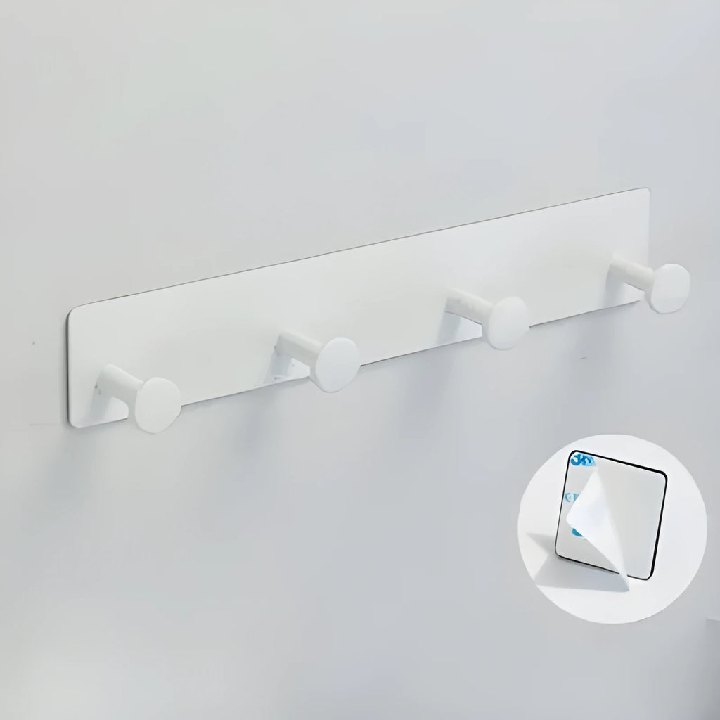 Iron adhesive wall hook with multiple arms on shower door, white double-sided tape visible