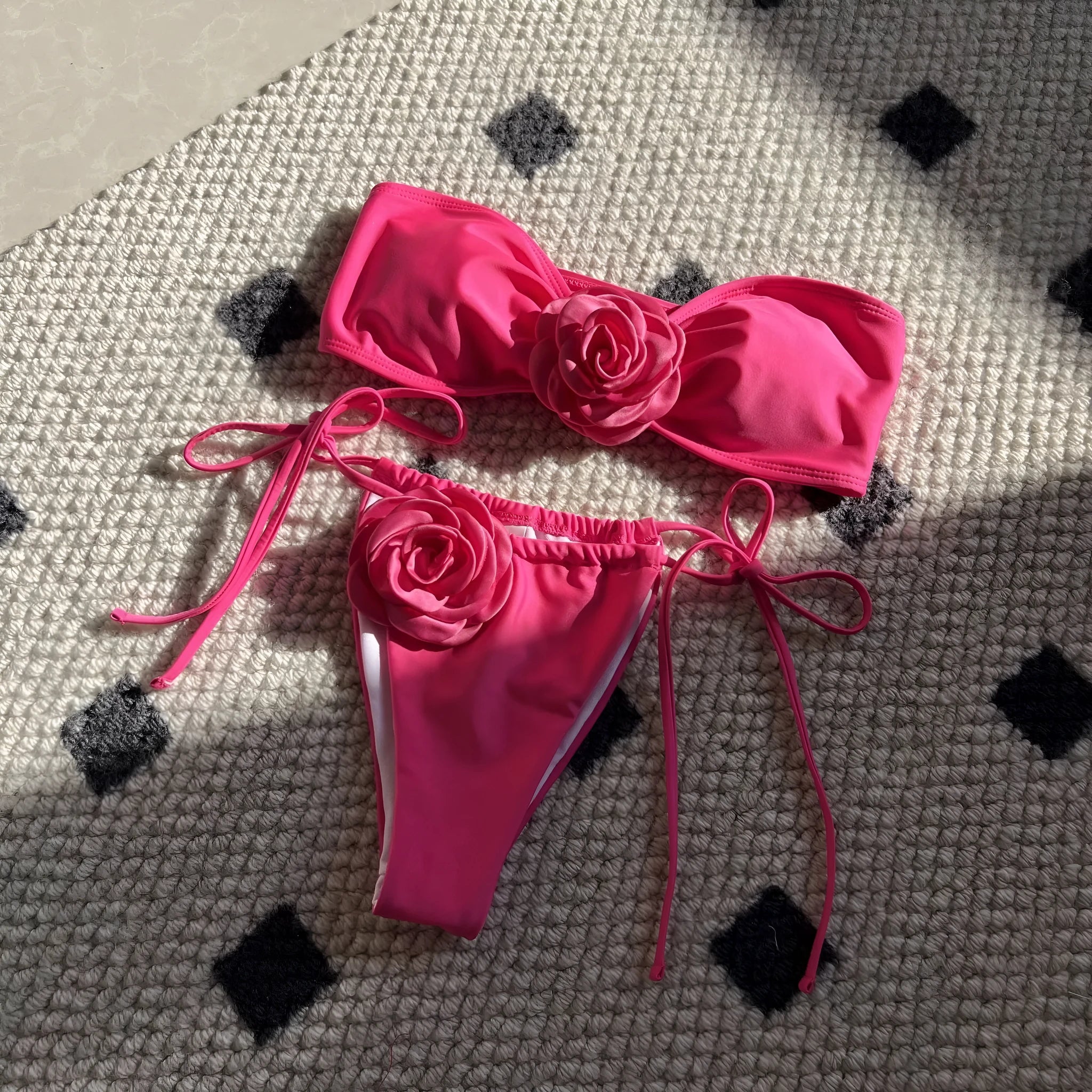 Solid colour rose tube top one-piece swimsuit for women with an adjustable drawstring strap and split style briefs.
