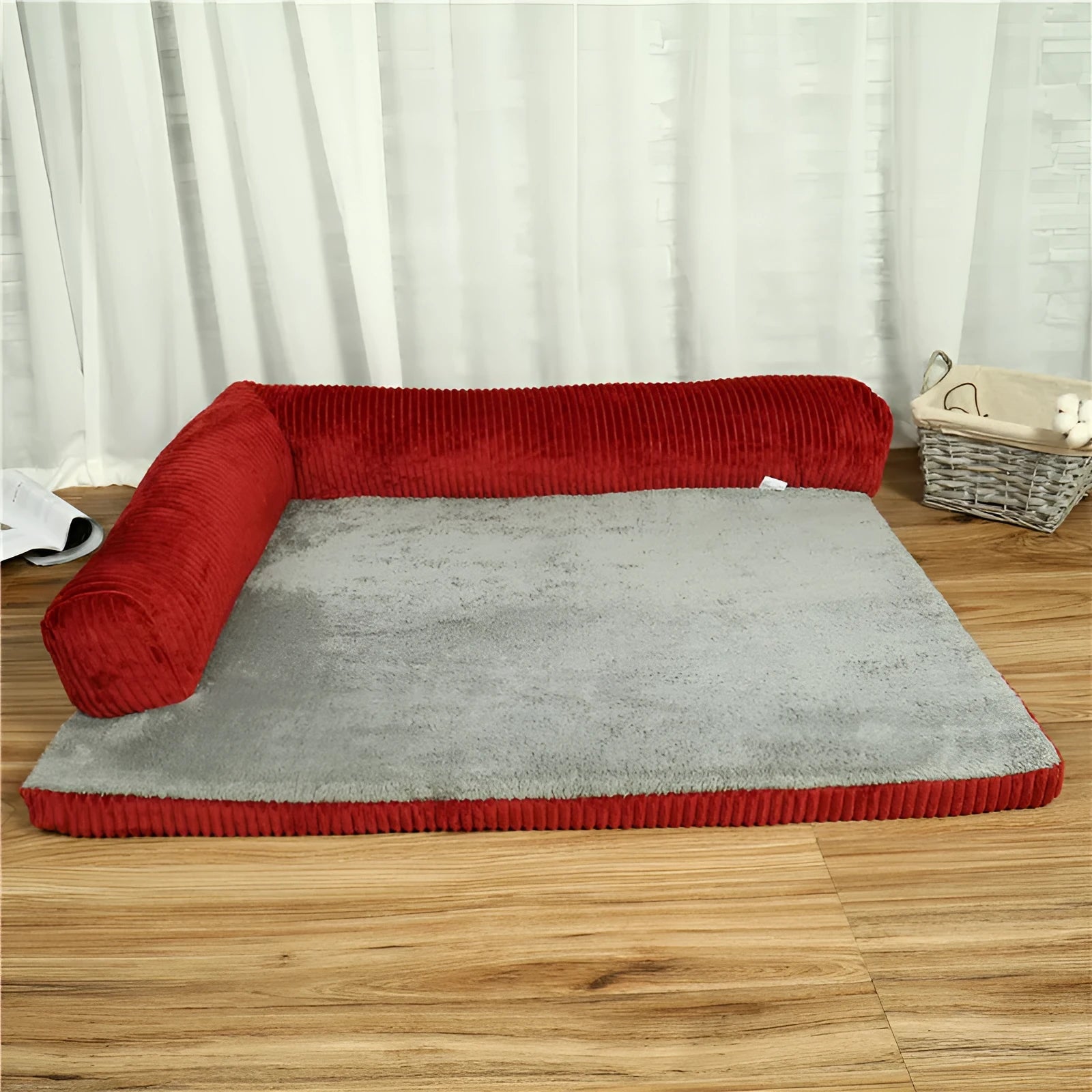 Corduroy bolster dog bed with non-slip base in grey, showing S M L XL size comparison.