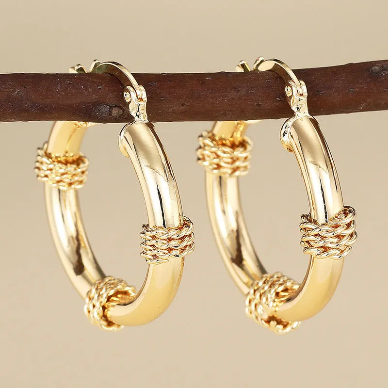 Geometric golden copper ear clip for women with ring and line design elements