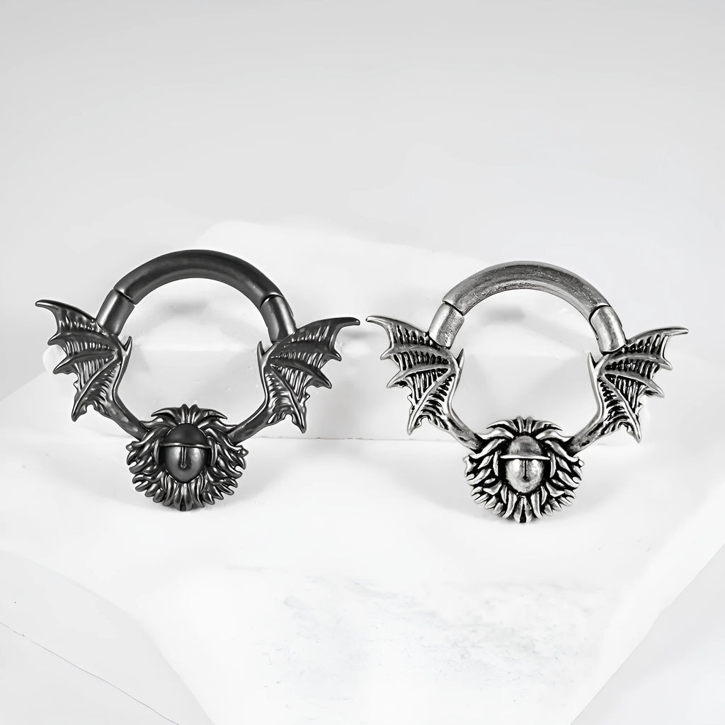 A pair of geometric cone and round shaped copper ear cuffs with magnetic clip-on fasteners.