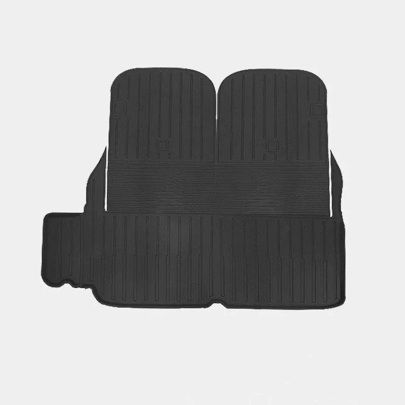 Rubber floor mat set for Tesla Model X showing foot pads and tailbox cushion for interior protection