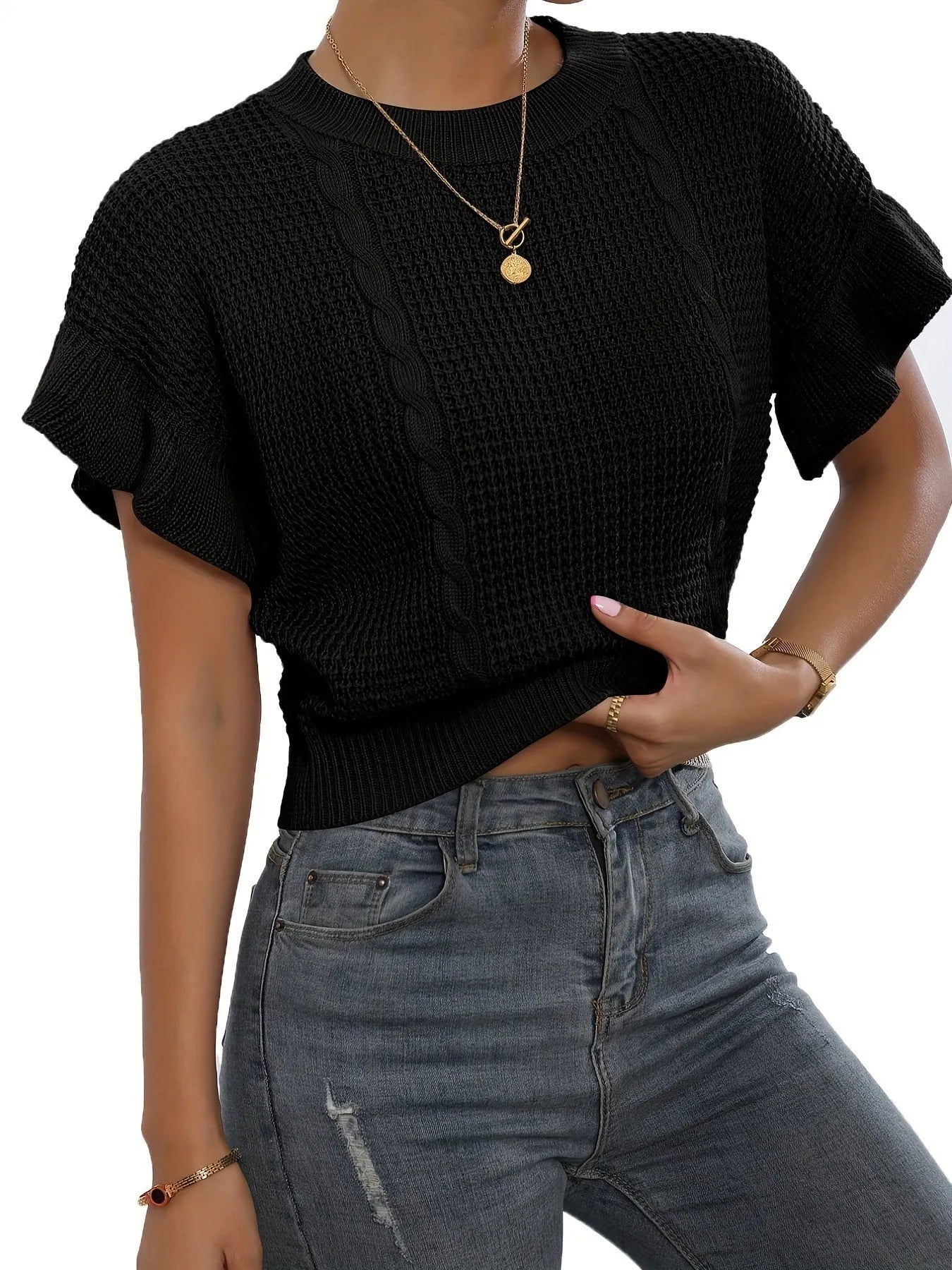 White knitted pullover sweater with ruffled short sleeves created from twisted string, shown in a loose fit.