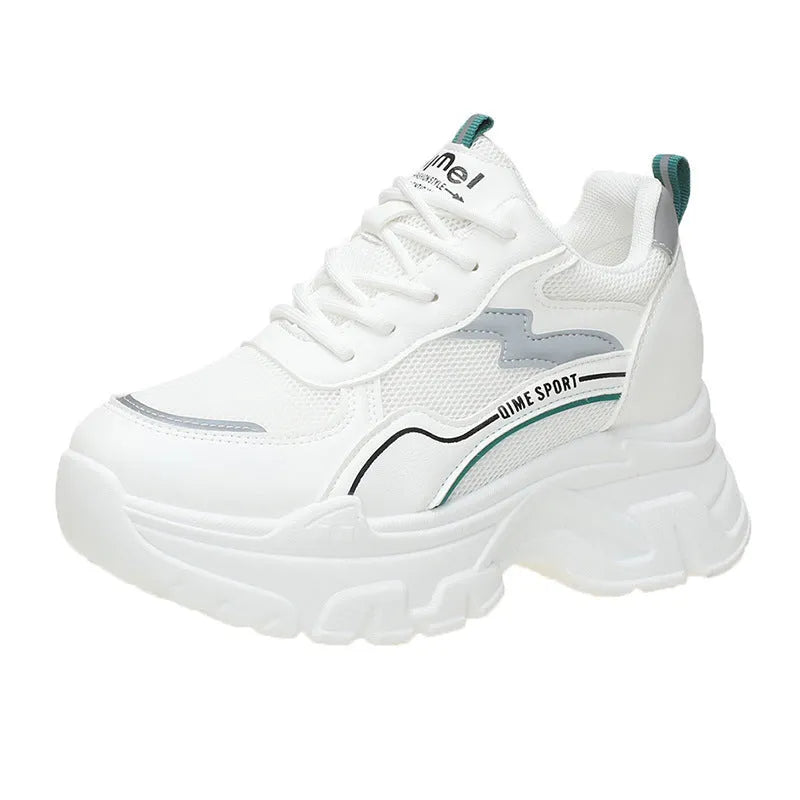 Women's beige and white height increasing dad shoes with mesh upper and cross shoulder straps.