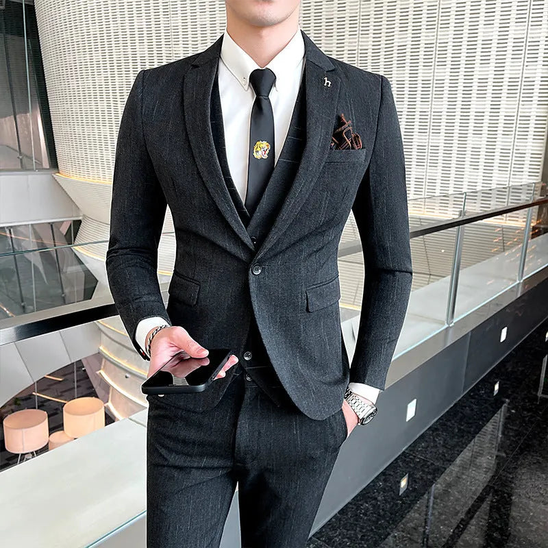 British style slim fit men's business suit in black or dark grey with adhesive interlining construction