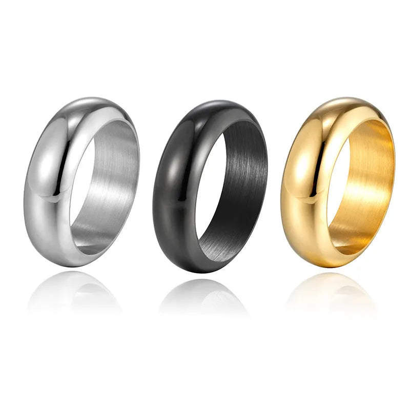 Glossy electroplated titanium steel ring in gold, black, or steel colour on a plain background.