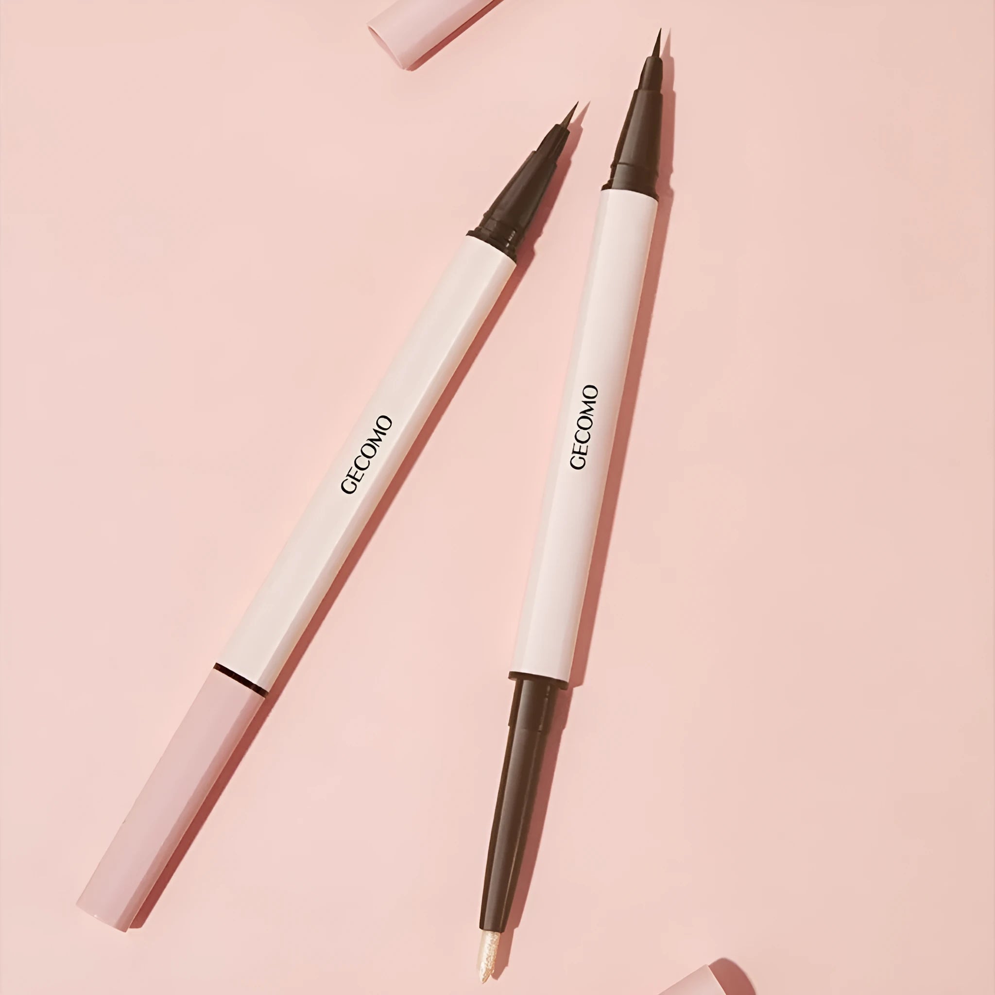 Double-headed silkworm pen eyeliner with pearlescent floating platinum and nude apricot colours