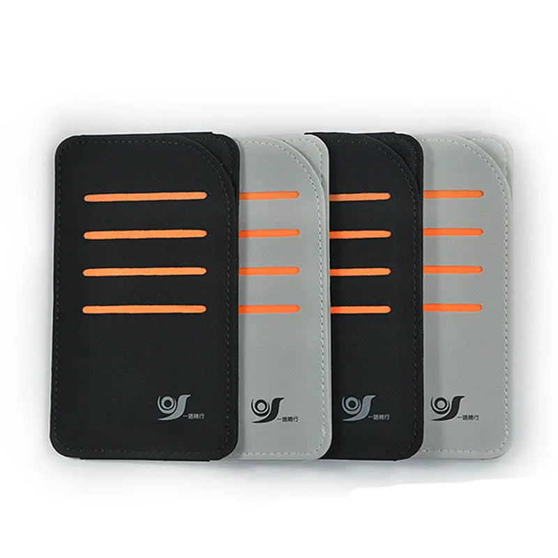 Car dashboard storage organiser with sun visor panels attached to a windscreen.