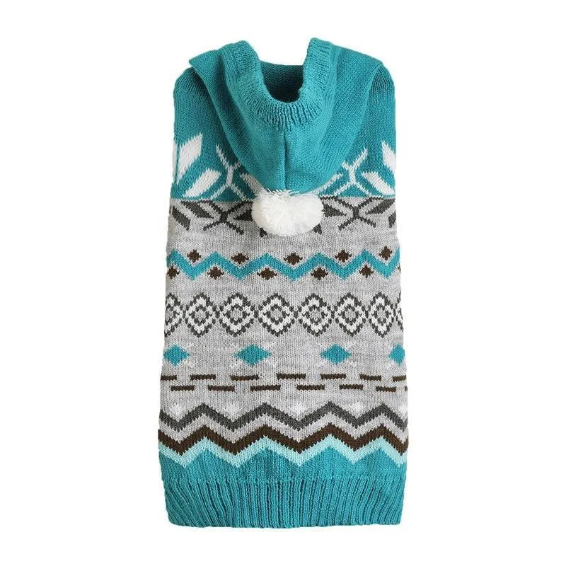 Green diamond pattern knit sweater on a small dog, showing classic design and soft acrylic fabric.