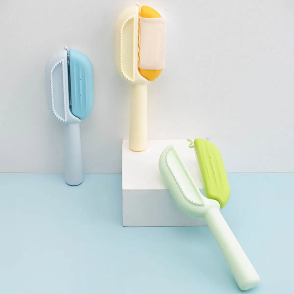 Blue pet grooming comb with water tank system for collecting floating hair during dog and cat brushing